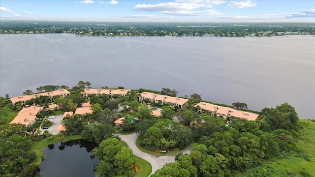 drone / aerial view featuring a water view