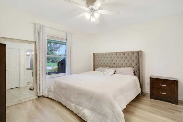 bedroom featuring ceiling fan and light wood-type flooring