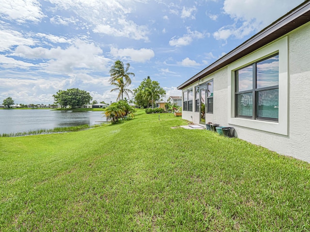 view of yard with a water view