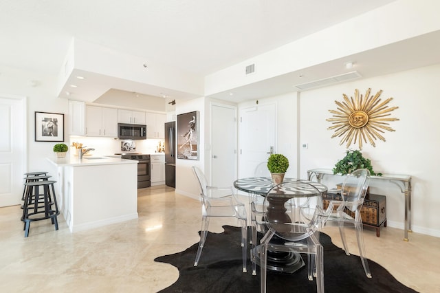 dining room with sink