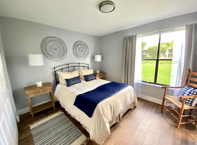 bedroom with wood-type flooring