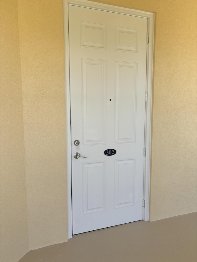 exterior space featuring stucco siding