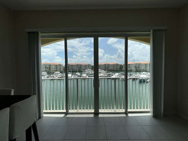 interior space with a water view and a view of city