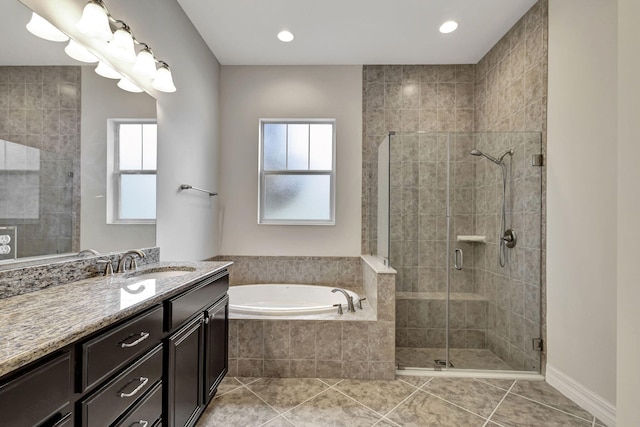 full bathroom with a garden tub, recessed lighting, vanity, a shower stall, and tile patterned floors