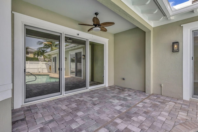 view of patio / terrace featuring a ceiling fan