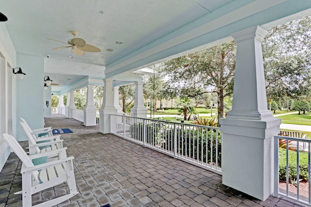 view of patio featuring ceiling fan and covered porch