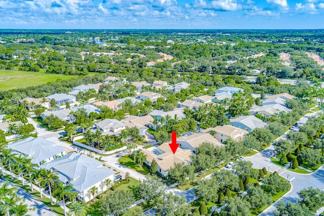 birds eye view of property with a residential view