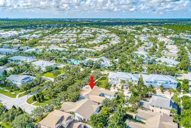 birds eye view of property with a residential view