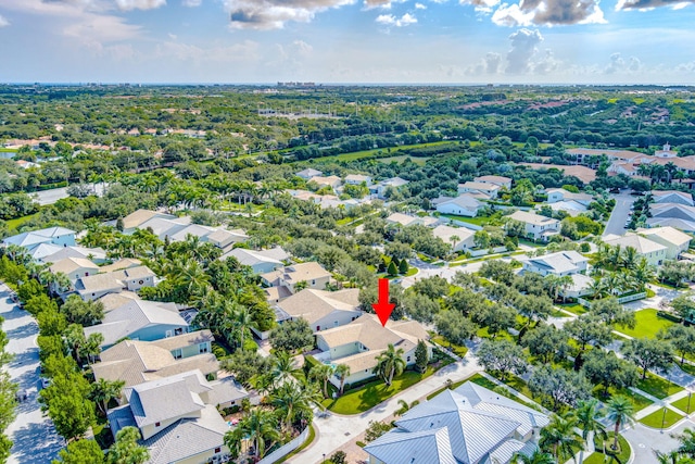 birds eye view of property with a residential view