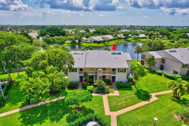 drone / aerial view with a water view