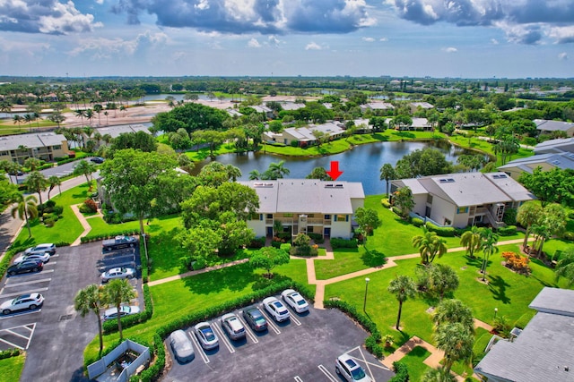 drone / aerial view featuring a water view