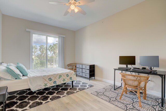 bedroom with ceiling fan and light hardwood / wood-style floors