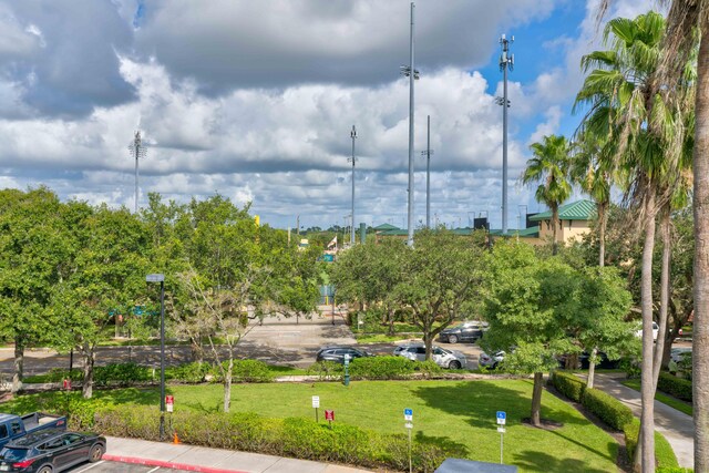 surrounding community featuring a lawn