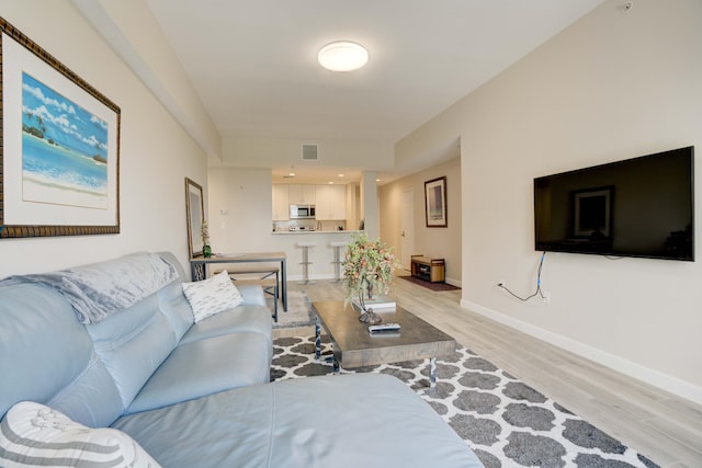 living room with light wood-type flooring