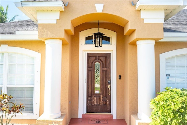 property entrance with a garage