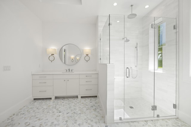 bathroom with vanity and walk in shower