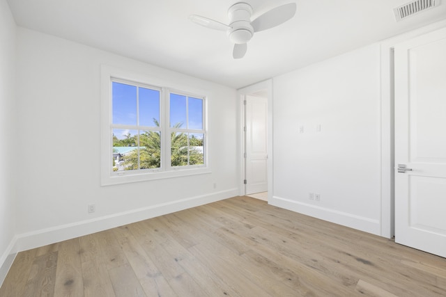 unfurnished room featuring ceiling fan and light hardwood / wood-style floors