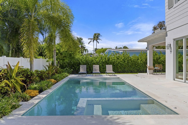 view of pool featuring a patio area