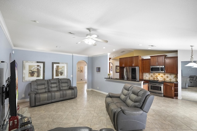 tiled living room with lofted ceiling, ceiling fan, and crown molding