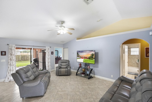 tiled living room featuring ceiling fan and lofted ceiling