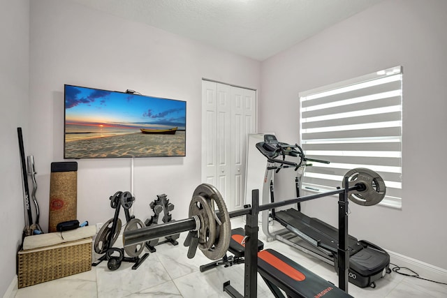 exercise area with tile patterned flooring