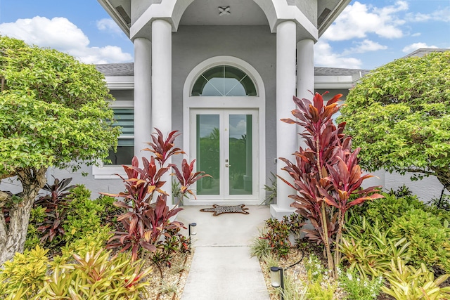 property entrance featuring french doors