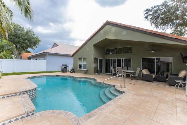 view of pool featuring a patio, ceiling fan, and outdoor lounge area