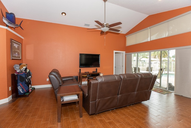 living room with ceiling fan, vaulted ceiling, and hardwood / wood-style flooring