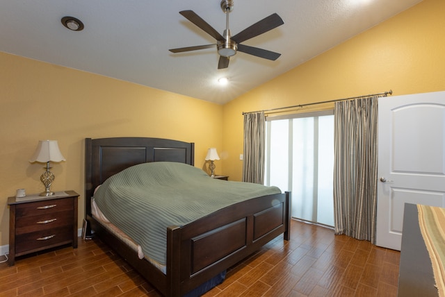 bedroom with lofted ceiling, dark hardwood / wood-style flooring, and ceiling fan