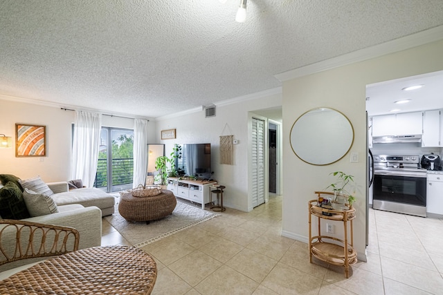 tiled living room with crown molding and a textured ceiling