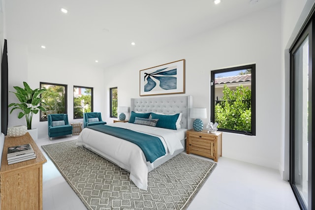 bedroom featuring a high ceiling