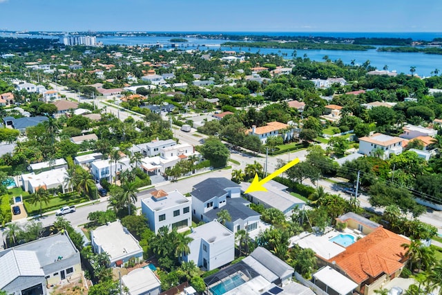 drone / aerial view with a water view