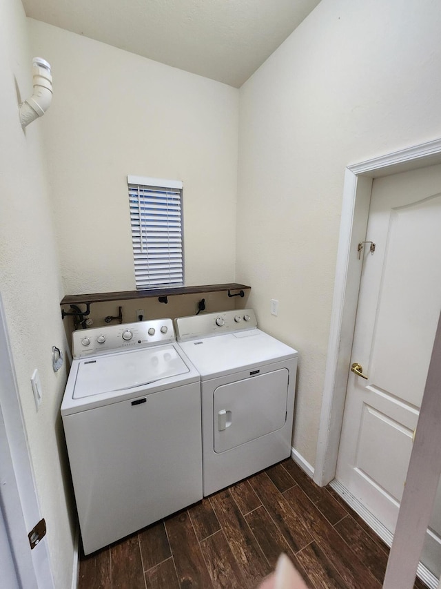 kitchen with sink, dark hardwood / wood-style flooring, and appliances with stainless steel finishes