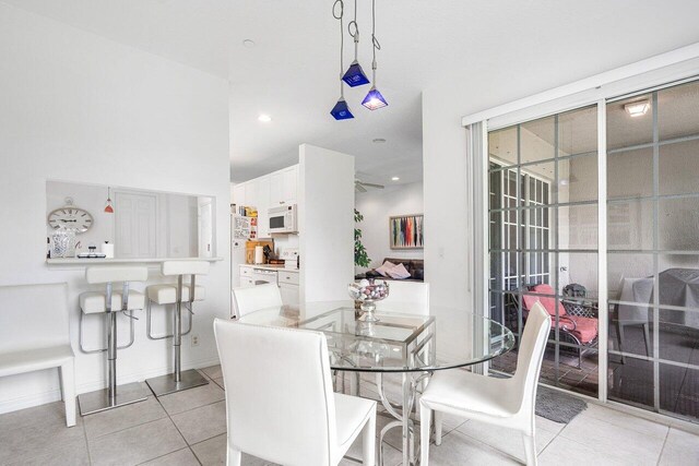 dining room with light tile patterned floors