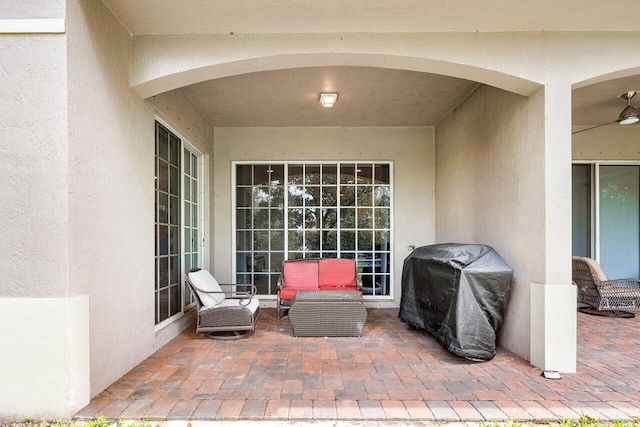 view of patio with a grill