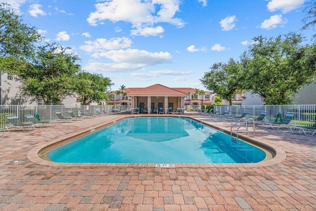 view of pool featuring a patio area