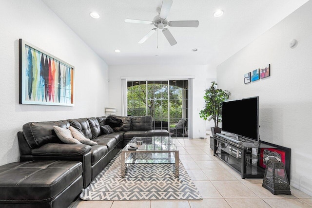 living room featuring ceiling fan and light tile patterned flooring