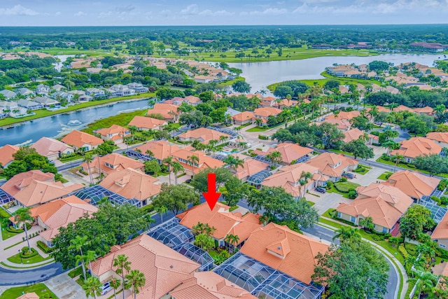 drone / aerial view with a water view