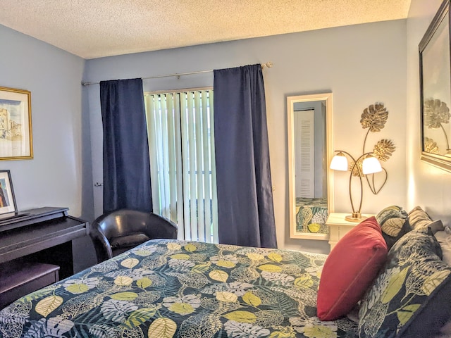 bedroom featuring a textured ceiling