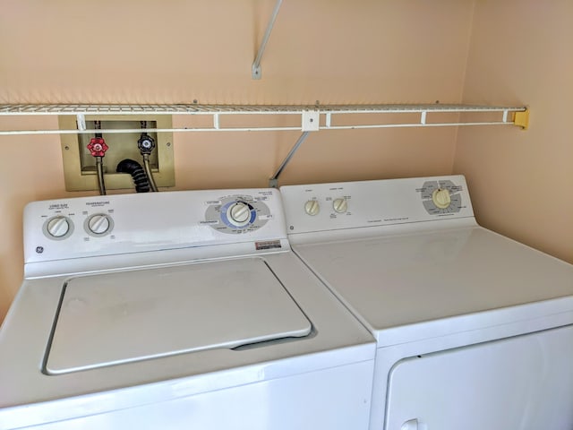 washroom featuring separate washer and dryer