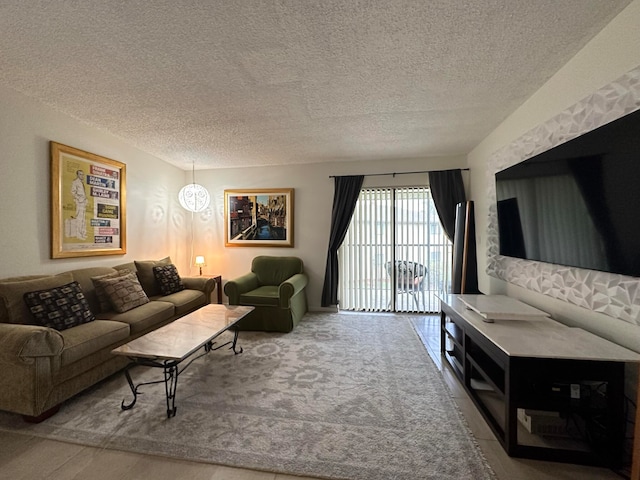 living room featuring a textured ceiling