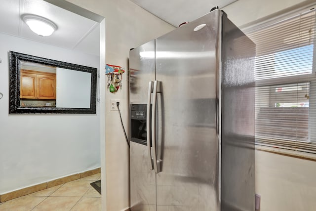 bathroom with tile patterned floors