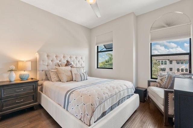 bedroom featuring ceiling fan and dark hardwood / wood-style floors