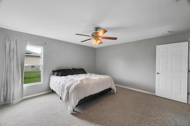 bedroom featuring carpet and ceiling fan