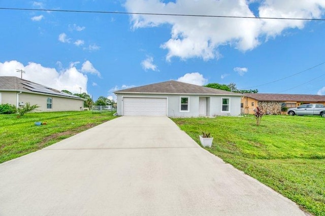 single story home with a front yard and a garage