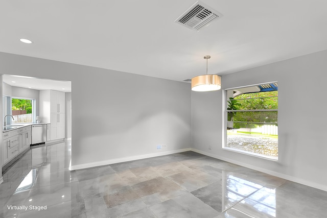 spare room featuring sink