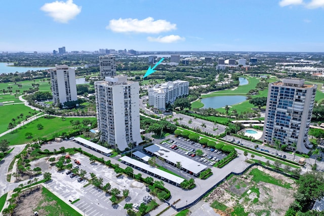 drone / aerial view with a view of city and a water view