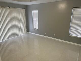 view of tiled spare room