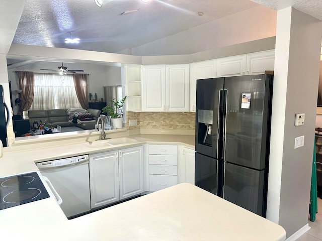 kitchen with white cabinets, ceiling fan, sink, fridge with ice dispenser, and dishwasher