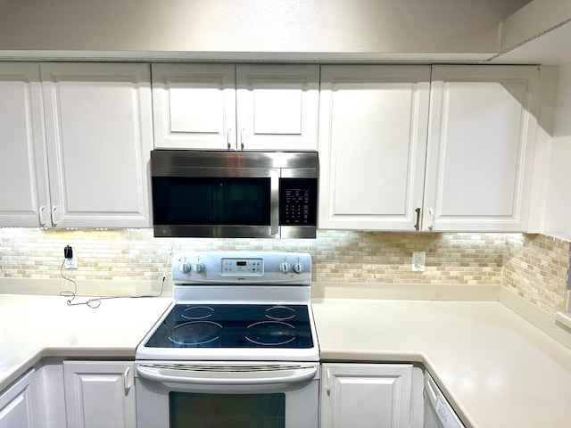 kitchen with white cabinetry, range with electric cooktop, and tasteful backsplash